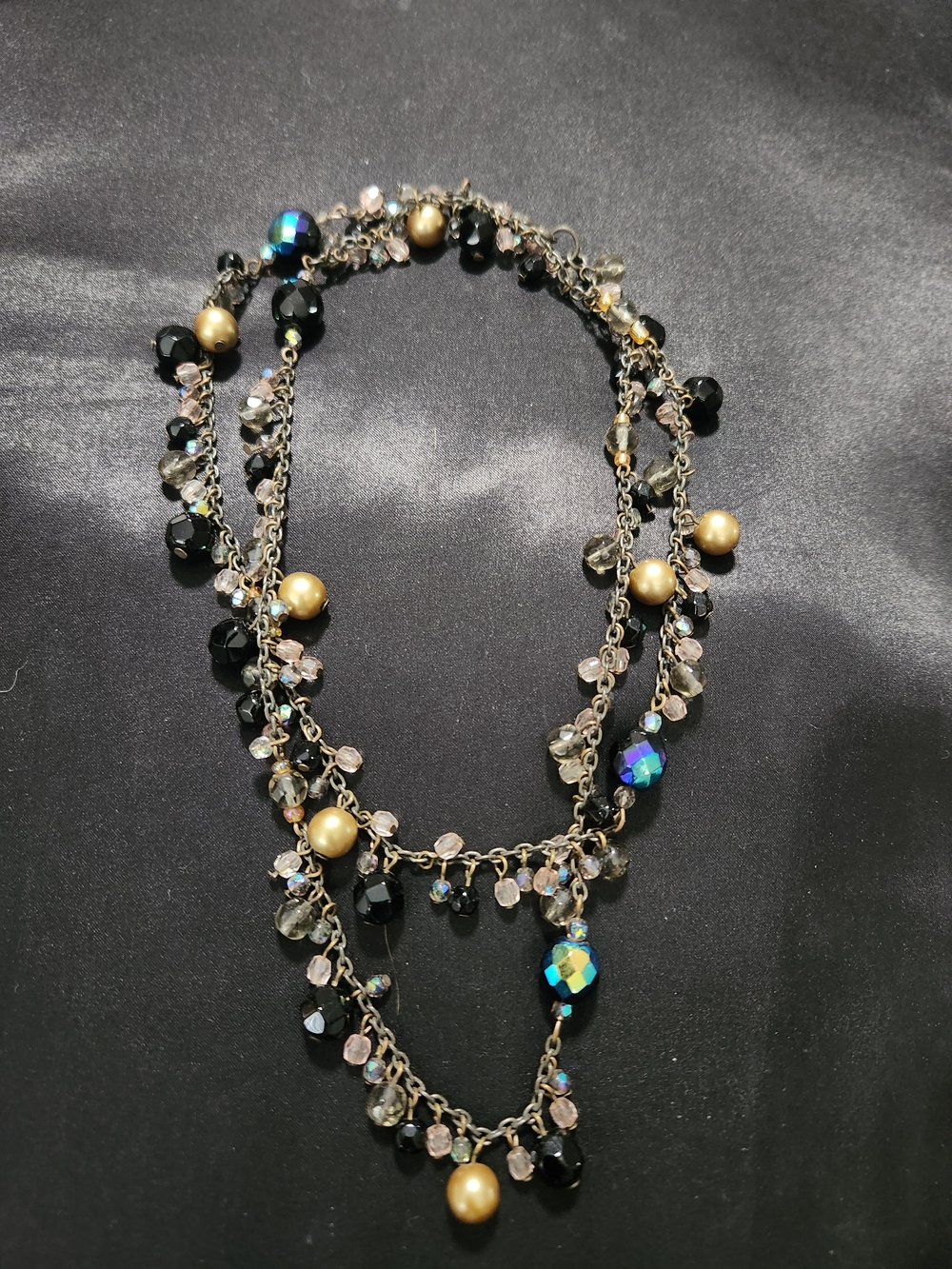 Elegant Black and Gold Multi-Strand Beaded Necklace